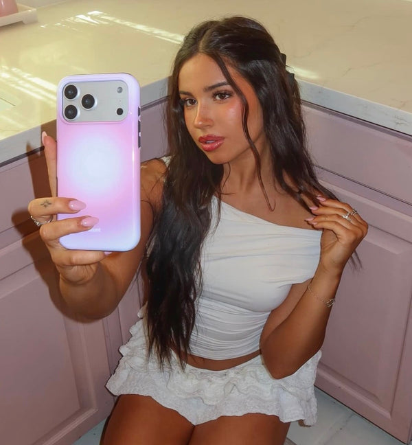 Customer holding a Blunt Cases phone case
