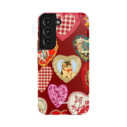 Vintage Love Samsung Case: a variety of vintage heart designs on a rich red background
