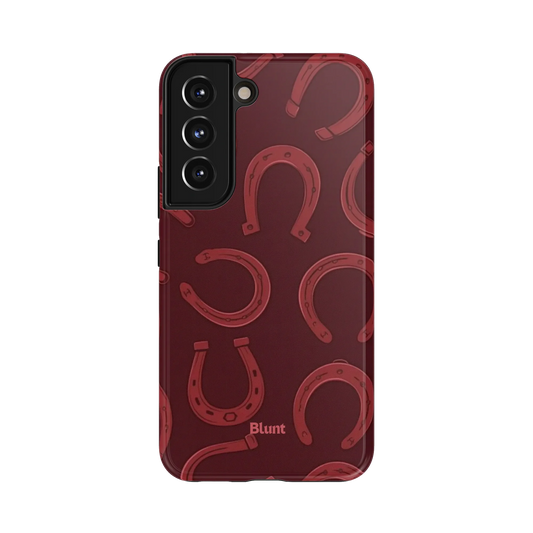 Lucky Charm Samsung Case: stylized red horseshoes against a dark red backdrop