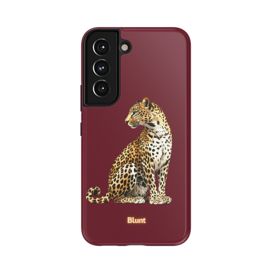 Keyari Samsung Case: a spotted leopard poised elegantly on a burgundy backdrop