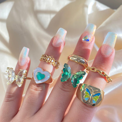 Emerald Flutter Ring - blunt cases